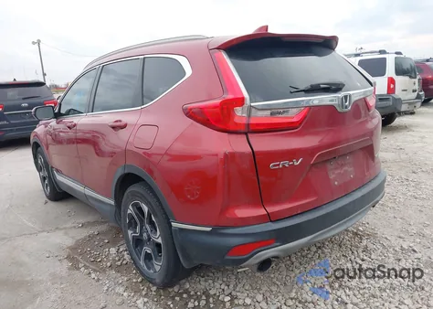 2019 Honda Cr-V Touring z USA, uszkodzony, nr VIN 5J6RW1H92KL004111